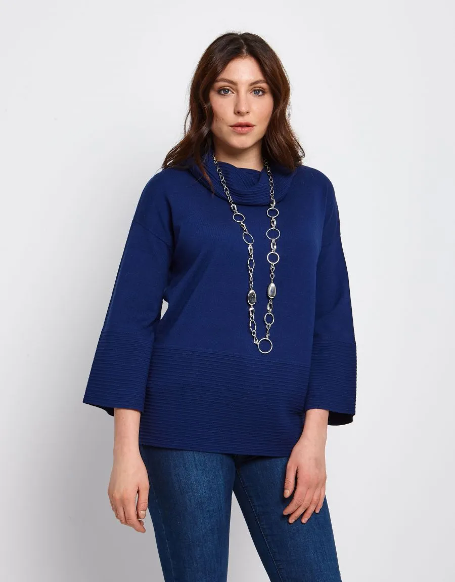 Maglia a poncho con collo alto