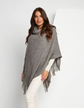 Poncho a collo alto e frange