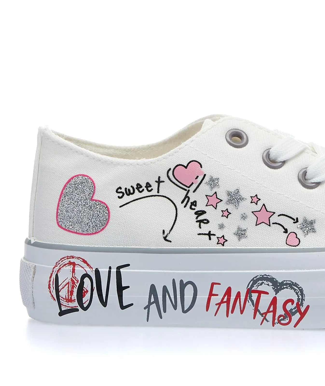 Sneakers bianche in tessuto con disegni